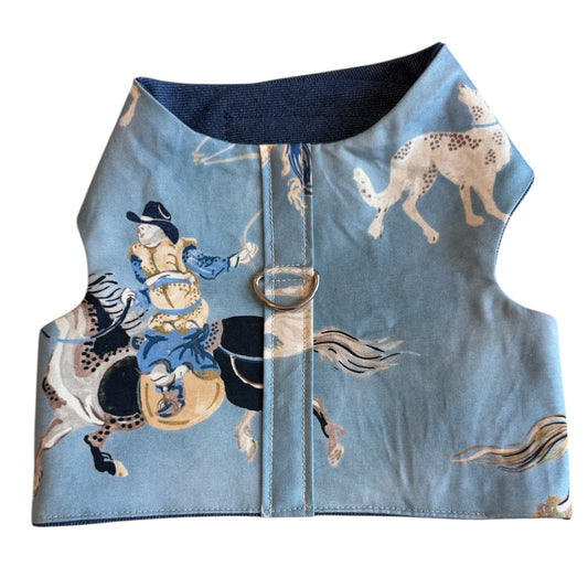 Dog harness with horse and rider design on a light blue background