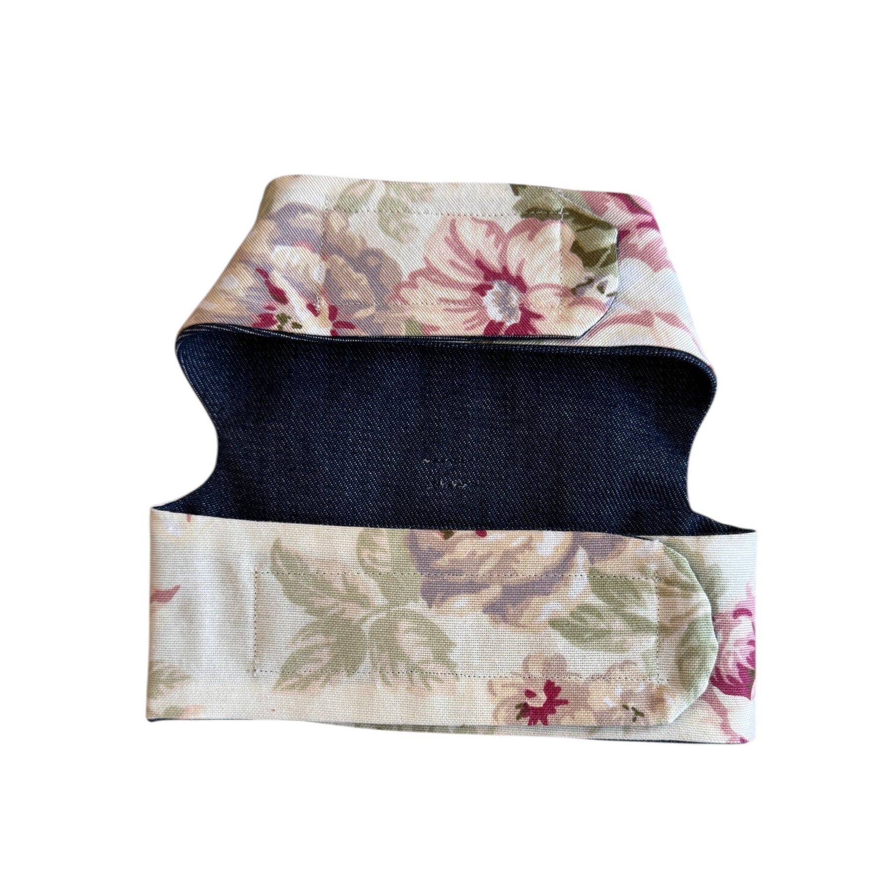 Floral-patterned dog harness on a white background
