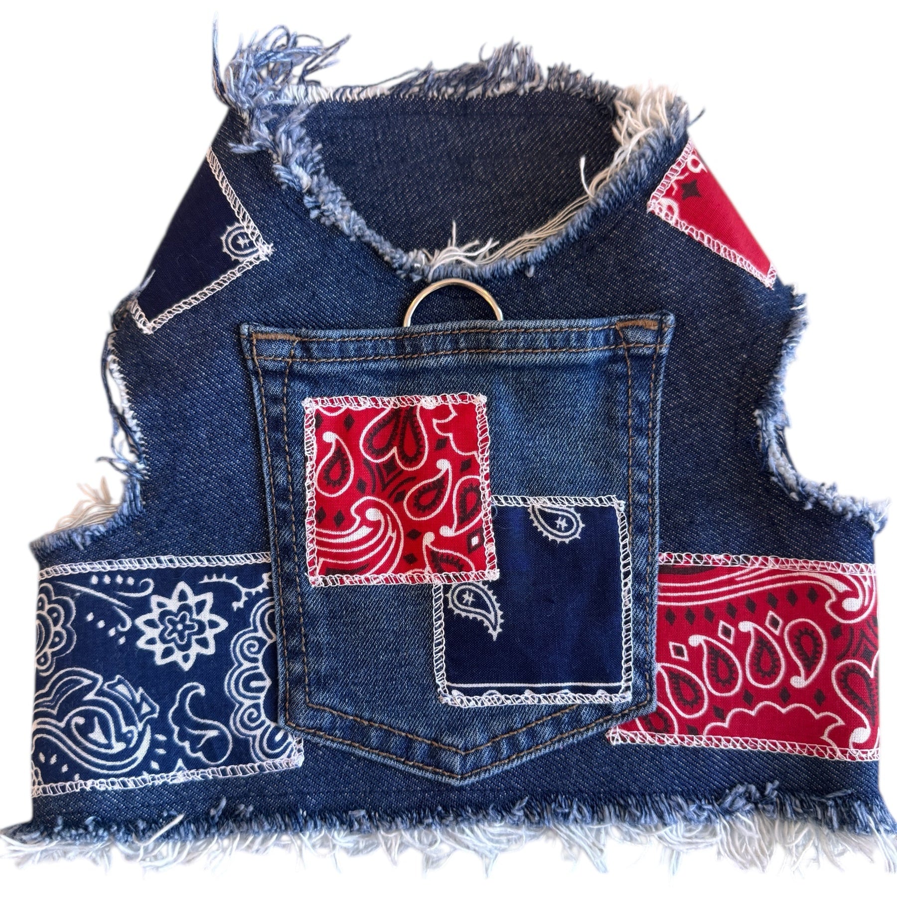 Denim harness with red &blue bandana patches on a white background