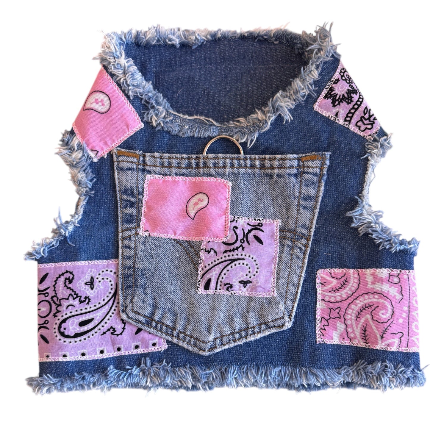 Denim harness with pink & purple bandana patches on a white background