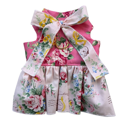 Floral dress with a large bow on a white background