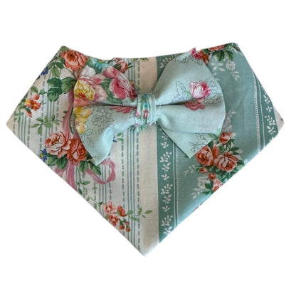 Floral patterned bandana with a bow on a white background