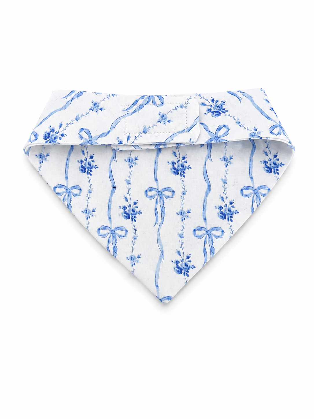A white triangular pet bandana featuring a blue watercolor-style floral and ribbon pattern, displayed flat against a clean white background.