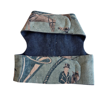 Denim vest with vintage-style graphic design on a white background