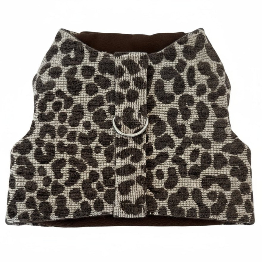 Leopard print dog harness on a white background
