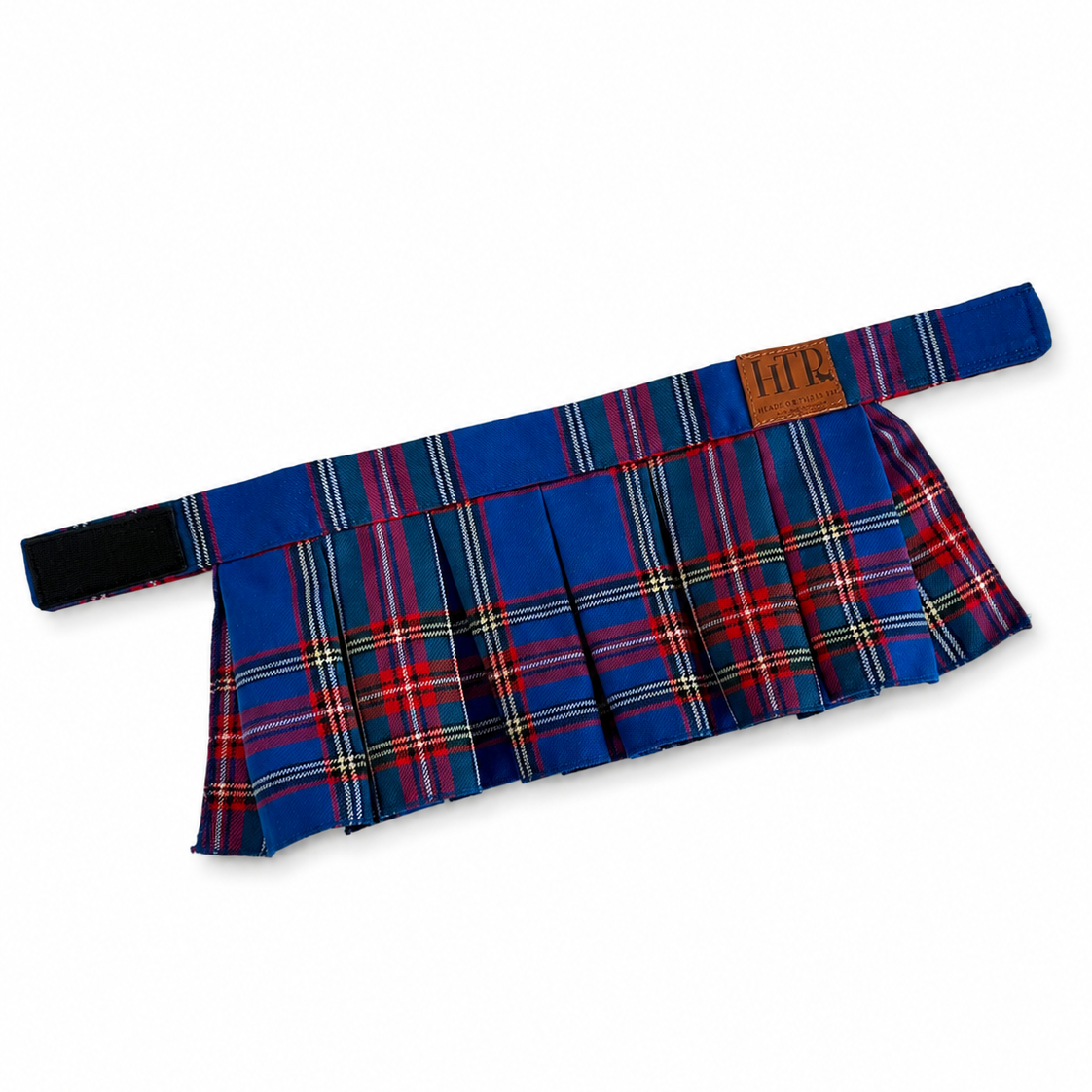 A pleated tartan skirt in a blue, red, and yellow plaid pattern, featuring a matching waistband with a brown leather brand patch that reads 'HTP'.